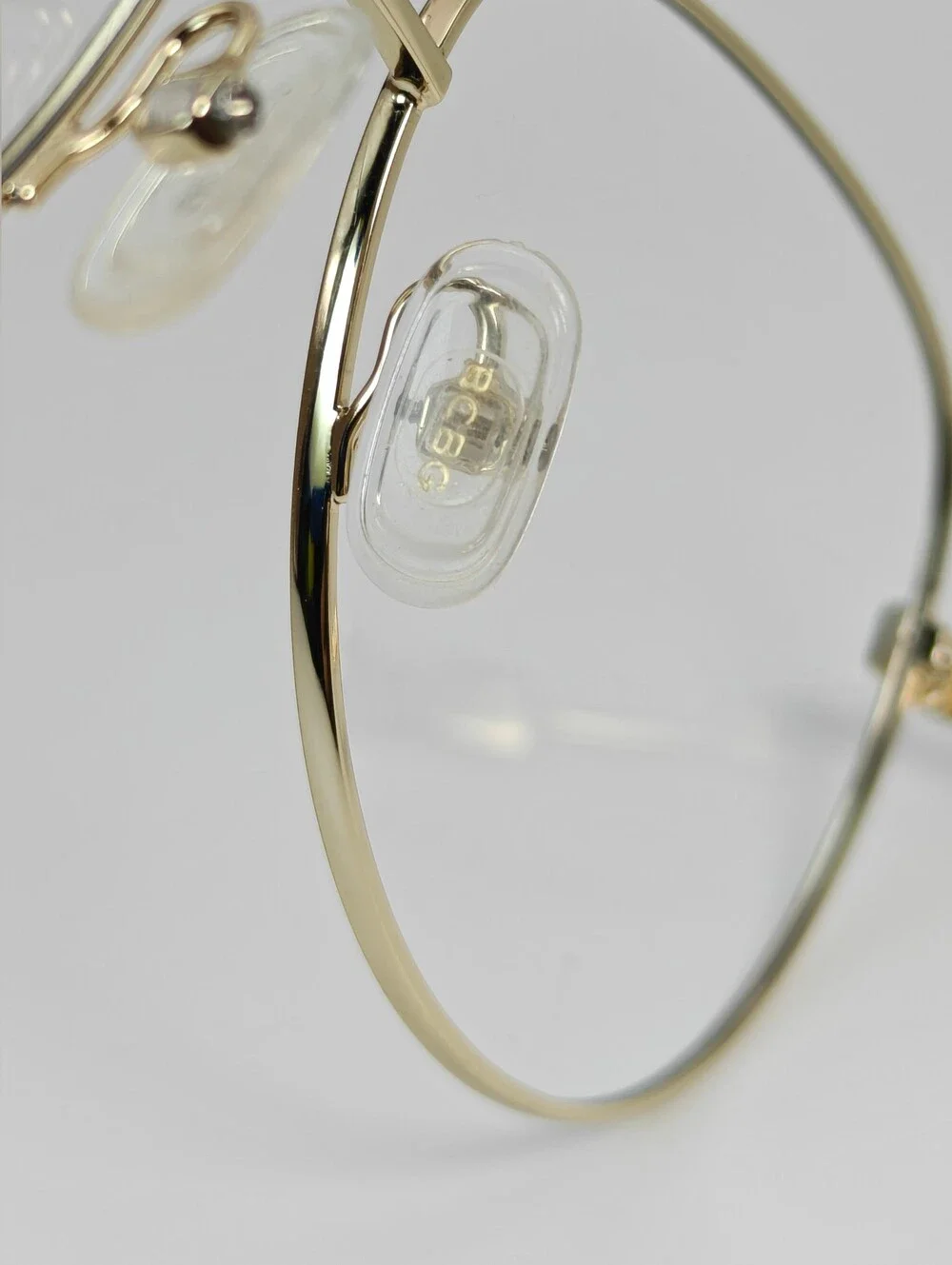 BCBGMAXAZRIA Call Aviator Eyeglass Frames in Black and Gold. Feminine.